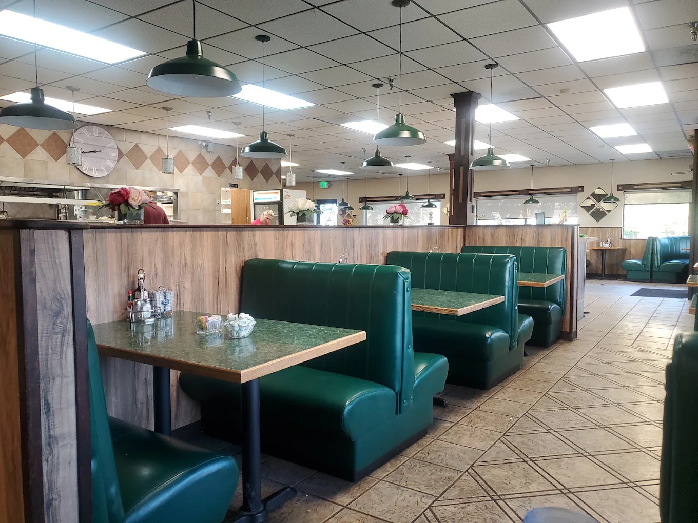 Inside Mat-Su Family Restaurant — warm booths and long counter